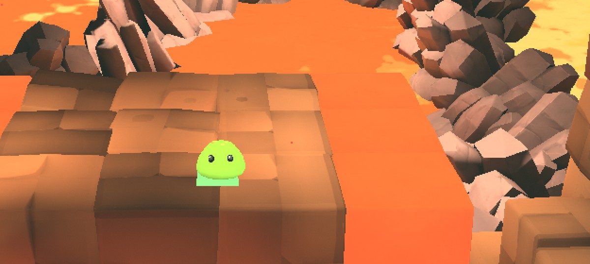 A wide lava crossing in Kubo with blocky cliffs and an orange sky.